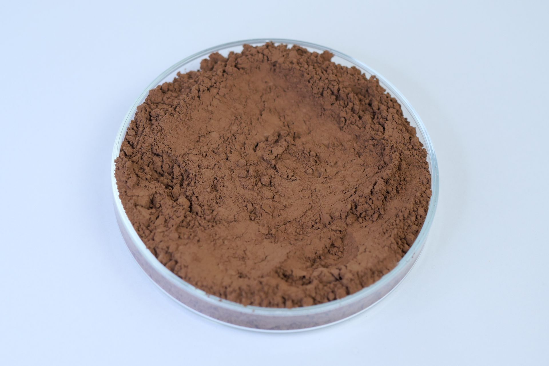 Soft dark chocolate powder on a dish
